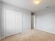 A bedroom features carpet, a double-door closet and neutral walls creating a comfortable atmosphere at 372 Willet St, Haines City, FL 33844