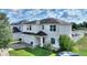 Two-story home with a two-car garage, well-manicured lawn, and inviting curb appeal at 372 Willet St, Haines City, FL 33844