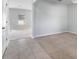 Neutral living room with beige carpet and tile entryway at 372 Willet St, Haines City, FL 33844