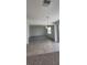 Open floor plan living room featuring tile floor and a contemporary chandelier at 4062 Serene Water Ave, Eustis, FL 32736