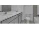 Bathroom with double sink vanity, quartz countertops, and modern fixtures at 502 Belmond Dr, Debary, FL 32713