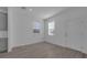 Living room with hard floors and a large window at 502 Belmond Dr, Debary, FL 32713
