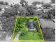 Aerial view of property lines in a green landscape, with nearby trees and greenery at 504 W Faith Ter, Maitland, FL 32751