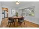 Cozy dining area features a round table with four chairs, complemented by natural light at 504 W Faith Ter, Maitland, FL 32751