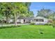 Charming single story home with a well-manicured lawn and mature landscaping creates excellent curb appeal at 504 W Faith Ter, Maitland, FL 32751