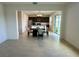 Open concept layout of the kitchen and dining room with lots of natural light at 5054 Tibet Ct, St Cloud, FL 34772
