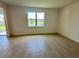 Bright living room features tile flooring and a lovely view at 5054 Tibet Ct, St Cloud, FL 34772