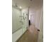 Sleek main bathroom featuring a stand up shower with glass door at 5054 Tibet Ct, St Cloud, FL 34772
