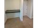 Office nook featuring tile flooring and a granite countertop space, perfect for creating a productive workspace at 5054 Tibet Ct, St Cloud, FL 34772