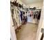 Spacious walk-in closet with ample hanging space and shelving for storage of clothes and accessories at 5054 Tibet Ct, St Cloud, FL 34772