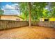 Backyard featuring trees, a private fence and lush landscaping at 508 W Plantation Blvd, Lake Mary, FL 32746