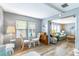 Inviting dining area with access to living spaces, providing a comfortable setting for meals and gatherings at 508 W Plantation Blvd, Lake Mary, FL 32746