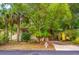 Charming home featuring a well-maintained exterior, lush landscaping and inviting curb appeal at 508 W Plantation Blvd, Lake Mary, FL 32746