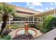 A water fountain surrounded by plants and trees, enhancing the appeal of the exterior at 508 W Plantation Blvd, Lake Mary, FL 32746