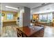 Inviting combined living space featuring an open floor plan and wood-look laminate floors at 508 W Plantation Blvd, Lake Mary, FL 32746