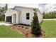 Well-maintained home with fresh landscaping, healthy lawn, and a two-car garage at 6106 Sw 127 Avenue Rd, Ocala, FL 34481