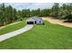 New construction featuring a charming single-story home, driveway, and freshly laid lawn at 6106 Sw 127 Avenue Rd, Ocala, FL 34481