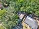 The aerial view shows the tree coverage surrounding the house and backyard at 626 Pearl Rd, Winter Springs, FL 32708