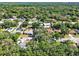 Well-maintained neighborhood showcases lush greenery and mature trees at 626 Pearl Rd, Winter Springs, FL 32708