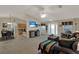 Open-concept living area with a ceiling fan connecting the dining and kitchen spaces at 626 Pearl Rd, Winter Springs, FL 32708