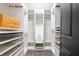 Walk-in closet with custom shelving and ample storage space for an organized wardrobe at 7065 Branch Court, St Cloud, FL 34771