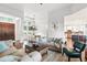 Spacious living room offering an open floor plan, comfortable seating, and stylish decor, perfect for relaxation at 7065 Branch Court, St Cloud, FL 34771