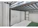 Bunkbeds with metal frame beside a closet with white doors, a window, and a ladder to climb to the top bunk at 7858 Sugar View Ct # 7858, Orlando, FL 32819