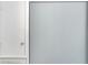 Storage closet with white door and metal doorknob beside a grey door with no doorknob and an open vent at 7858 Sugar View Ct # 7858, Orlando, FL 32819