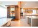Bright, modern kitchen with custom cabinets, an island, and stainless steel appliances at 8137 Pond Apple Dr, Winter Garden, FL 34787