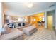 Open-concept living space showcasing kitchen, dining area, and a comfortable lounge area at 8137 Pond Apple Dr, Winter Garden, FL 34787