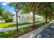 A view of the side of the home, showcasing the well-maintained lawn and perimeter fence at 8137 Pond Apple Dr, Winter Garden, FL 34787