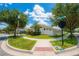 A corner lot with mature trees and lush landscaping offering great curb appeal at 8137 Pond Apple Dr, Winter Garden, FL 34787
