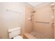 Bathroom featuring a tiled shower with a built-in bench and grab bar at 849 Millrace Pt, Longwood, FL 32750