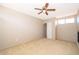 Cozy bedroom featuring a ceiling fan, carpet and a closet at 849 Millrace Pt, Longwood, FL 32750