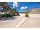 Charming home with an attached two-car garage, appealing landscaping, and a well-maintained walkway at 849 Millrace Pt, Longwood, FL 32750