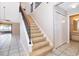 Inviting interior showcases staircase, tile flooring, and an open-concept layout at 849 Millrace Pt, Longwood, FL 32750
