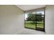 Screened lanai providing a beautiful view of the outdoors at 8560 Magnificent Ln, Groveland, FL 34736