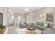 Upstairs living room with neutral furniture, plush carpet, and stylish decor providing a comfortable retreat at 8560 Magnificent Ln, Groveland, FL 34736