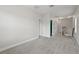 Upstairs hallway with neutral carpet, white walls, and white doors at 9389 Meadow Hunt Way, Winter Garden, FL 34787