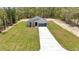 A well-manicured lawn leads up to this stunning home with an attached two car garage at 9695 Sw 125 Court Rd, Dunnellon, FL 34432