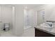 Bathroom with double sinks, a shower, and a separate toilet room for privacy at 979 Sun Burst Rd, Winter Haven, FL 33880