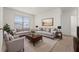 Comfortable living room with neutral colors and plush seating arrangements at 979 Sun Burst Rd, Winter Haven, FL 33880