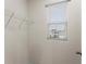 Bright walk-in closet with a window and wire shelving for optimal organization at 979 Sun Burst Rd, Winter Haven, FL 33880