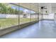 Backyard view showcases a spacious yard with white fence and additional storage building at 99 Eastridge Dr, Eustis, FL 32726