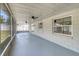 This covered screened porch adds extra space for relaxation and entertainment at 99 Eastridge Dr, Eustis, FL 32726