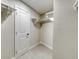 Walk-in closet features built-in shelves and ample storage space at 99 Eastridge Dr, Eustis, FL 32726