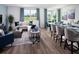 Open living area features a modern kitchen and bright living room, perfect for entertaining at 1122 Cumberland Trail Dr, Lake Hamilton, FL 33851