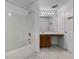 Bathroom with shower over bath, vanity, and tile flooring at 117 Clowson Ct, Ocoee, FL 34761