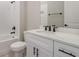 Bathroom featuring a shower/tub combo and vanity with quartz countertop and black hardware at 12460 Sw 48 Lane Rd, Ocala, FL 34481