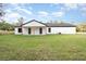 Exterior of home with large backyard at 12460 Sw 48 Lane Rd, Ocala, FL 34481
